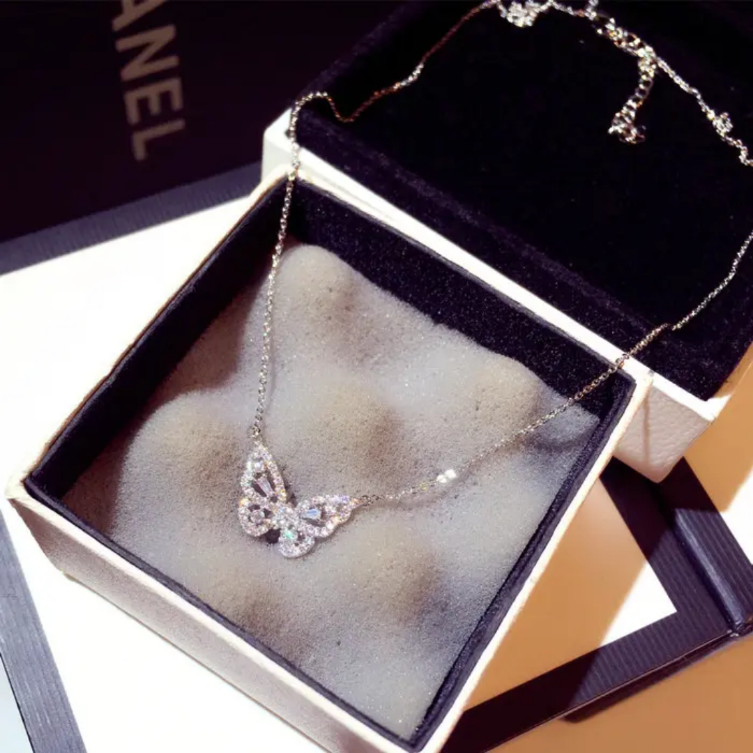 Gold mini butterfly necklace