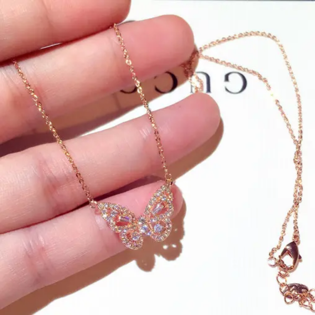 Gold mini butterfly necklace