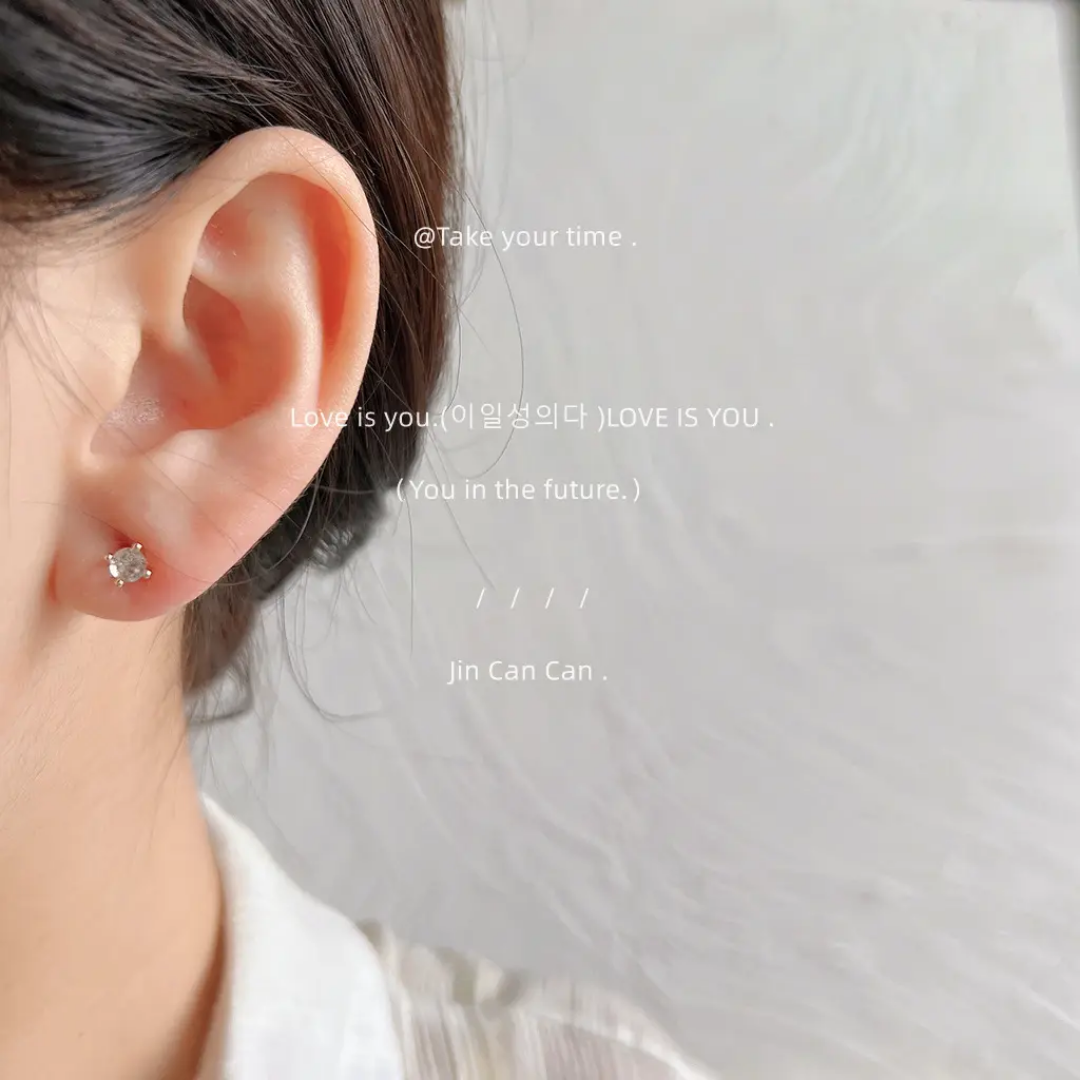 White tiny stud earing
