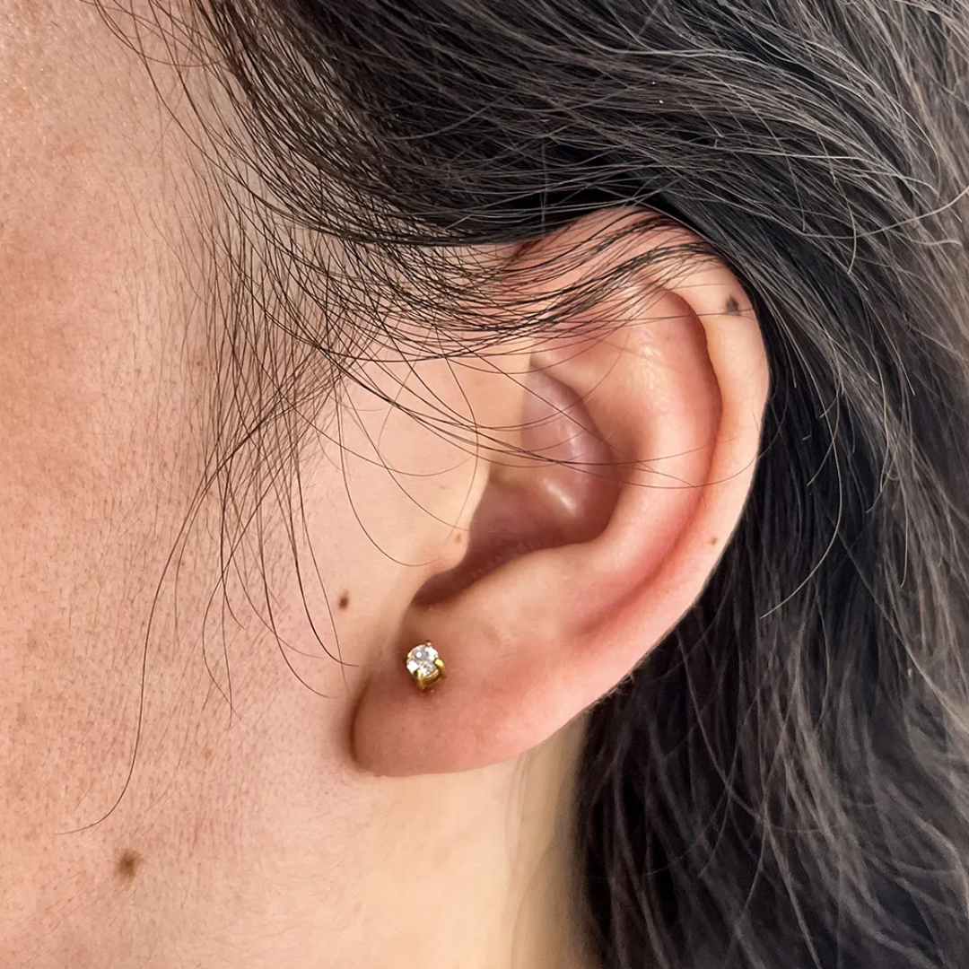 White tiny stud earing