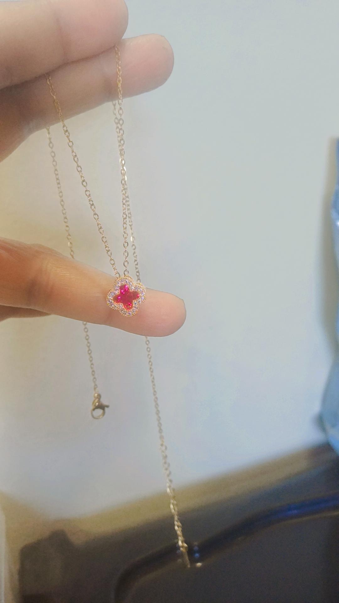 Gold dark pink clover necklace