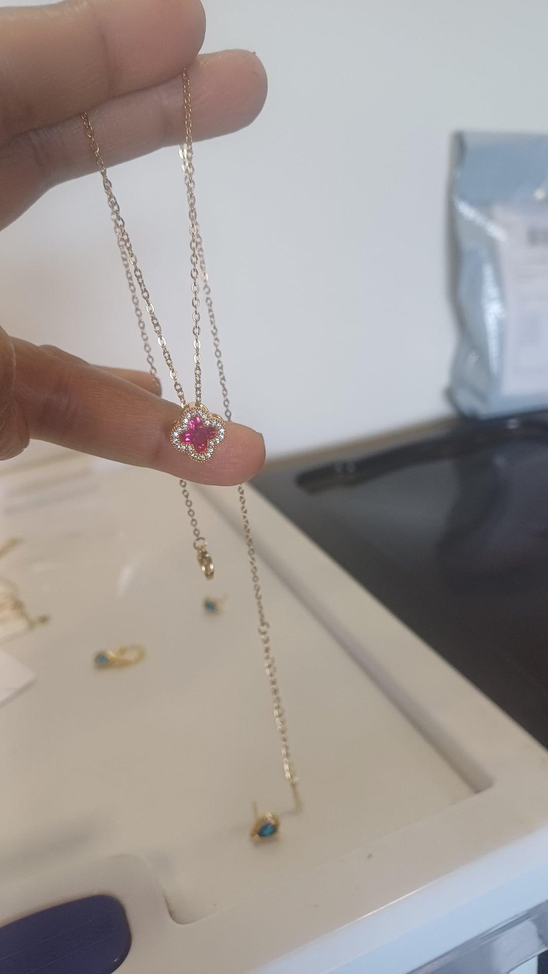 Gold dark pink clover necklace