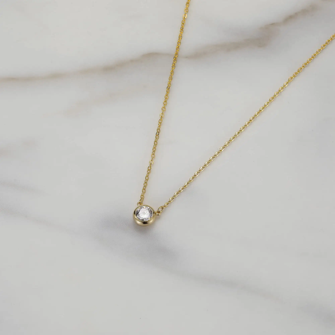 Minimalistic charm gold solitaire necklace