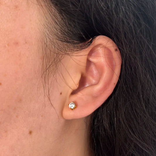 White tiny stud earing