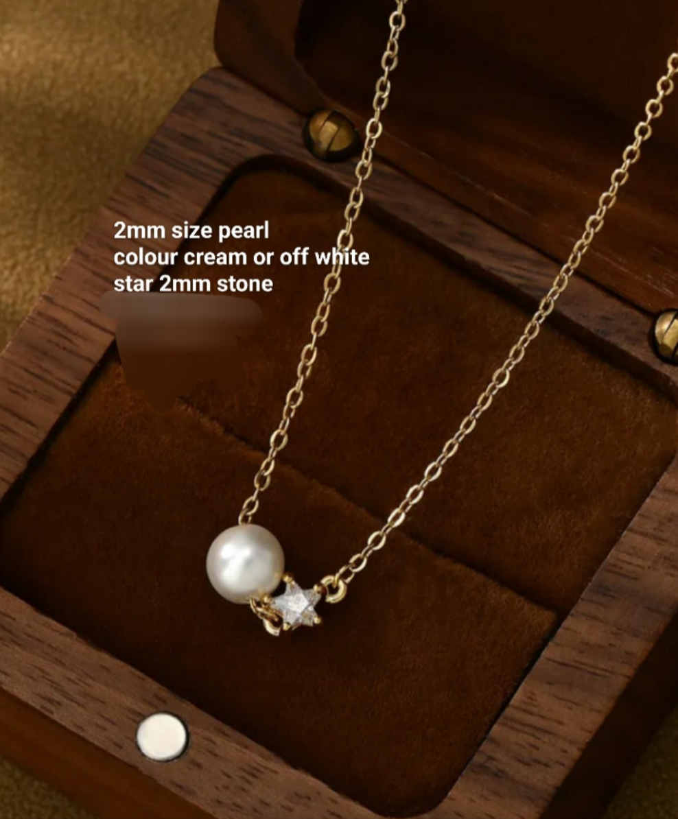 Pearl and star necklace