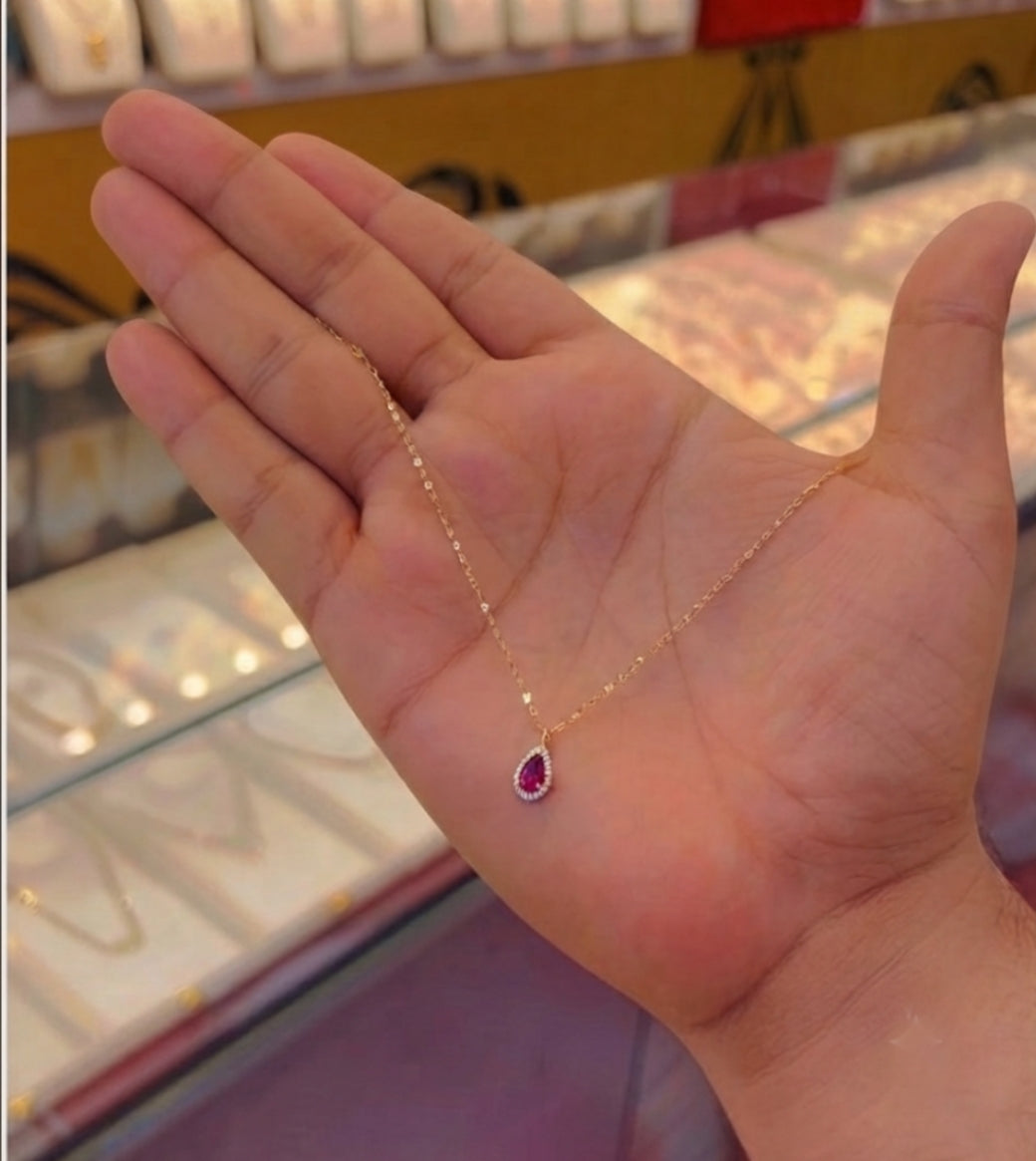 Ruby pink pear shape necklace.