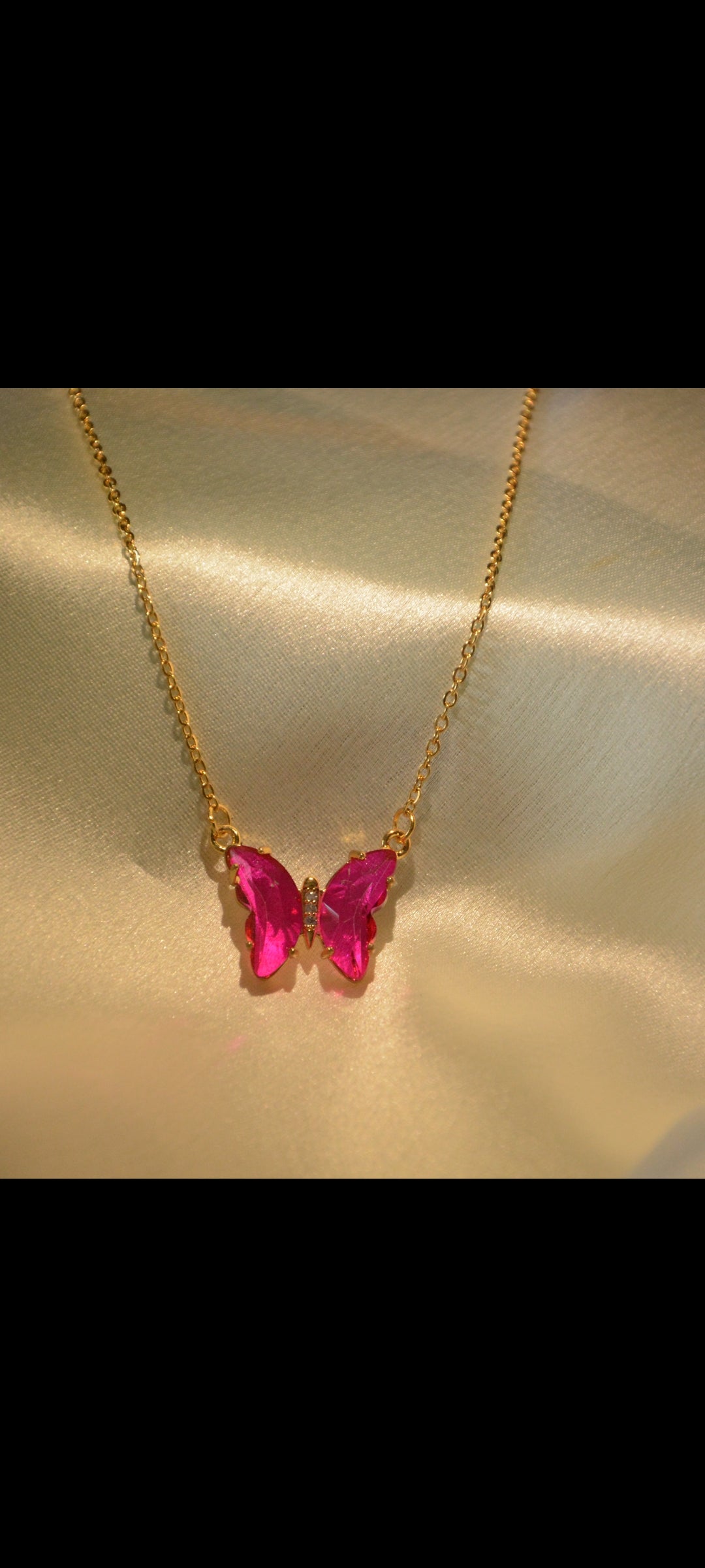 Fuchsia pink butterfly necklace