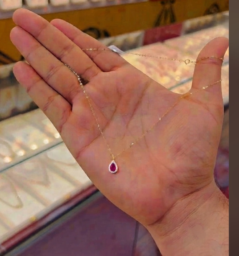 Ruby pink pear shape necklace.