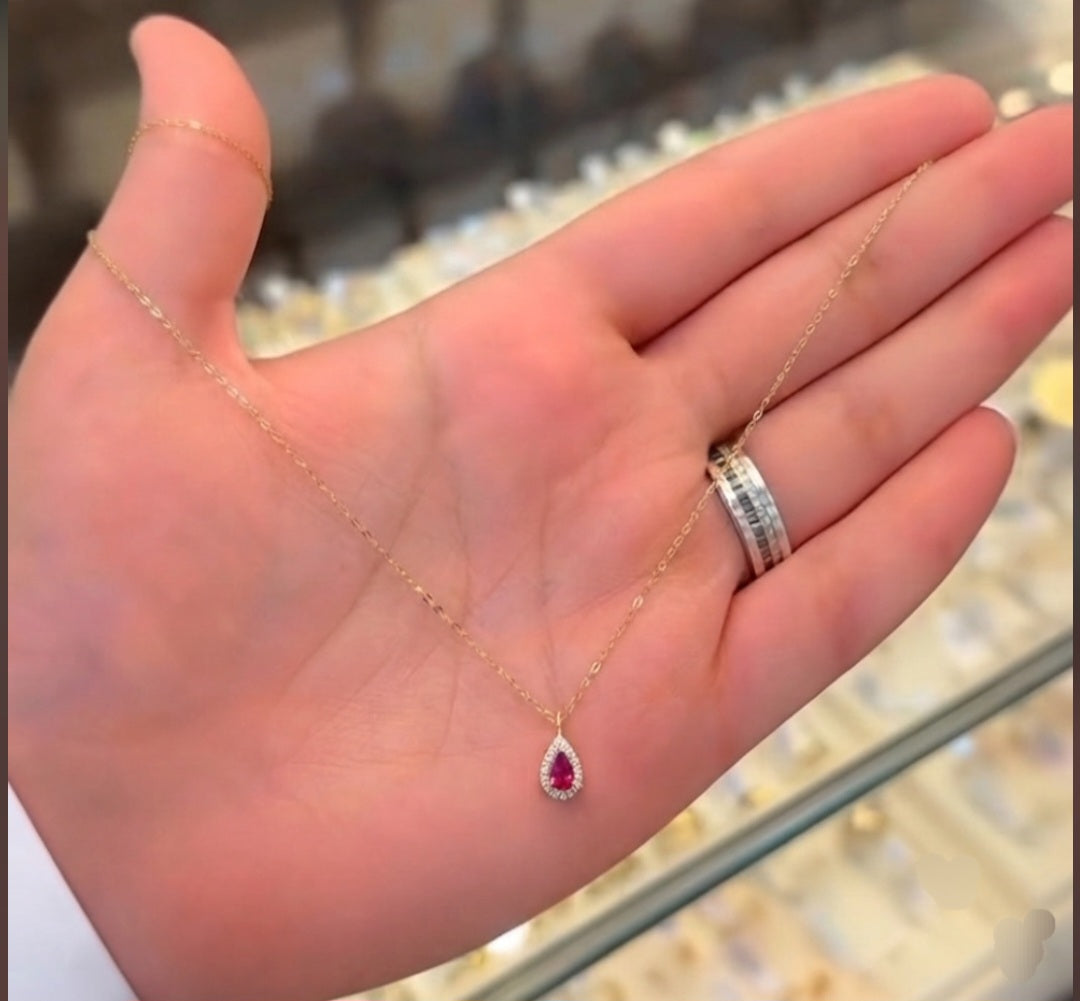 Ruby pink pear shape necklace.