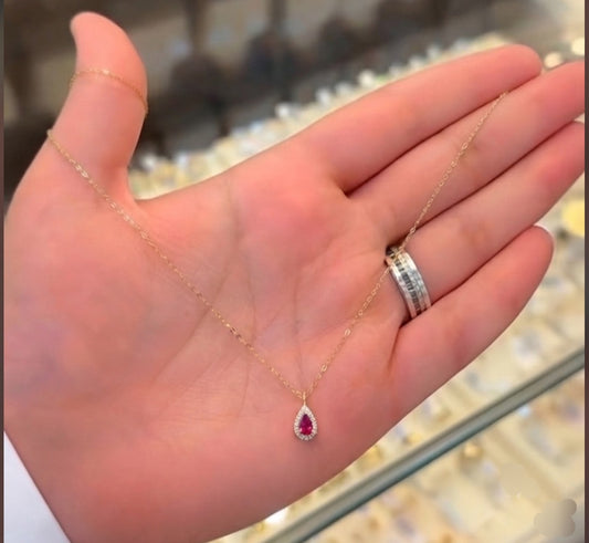 Ruby pink pear shape necklace.